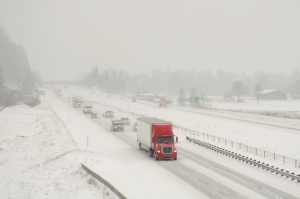 semi-truck-traffic-on-interstate-5-during-a-winter-snow-and-freezing-rain-storm