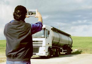 Truck driver taking a photo